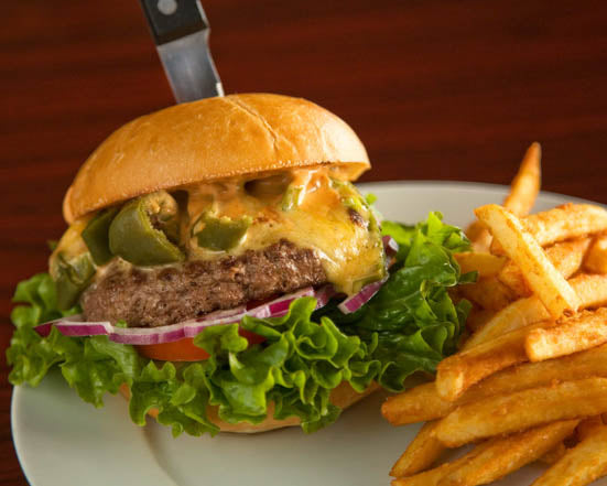 Double Cheese Burger with lettuce Tomato Sautéed Onions Peppers and Portobello Mushrooms